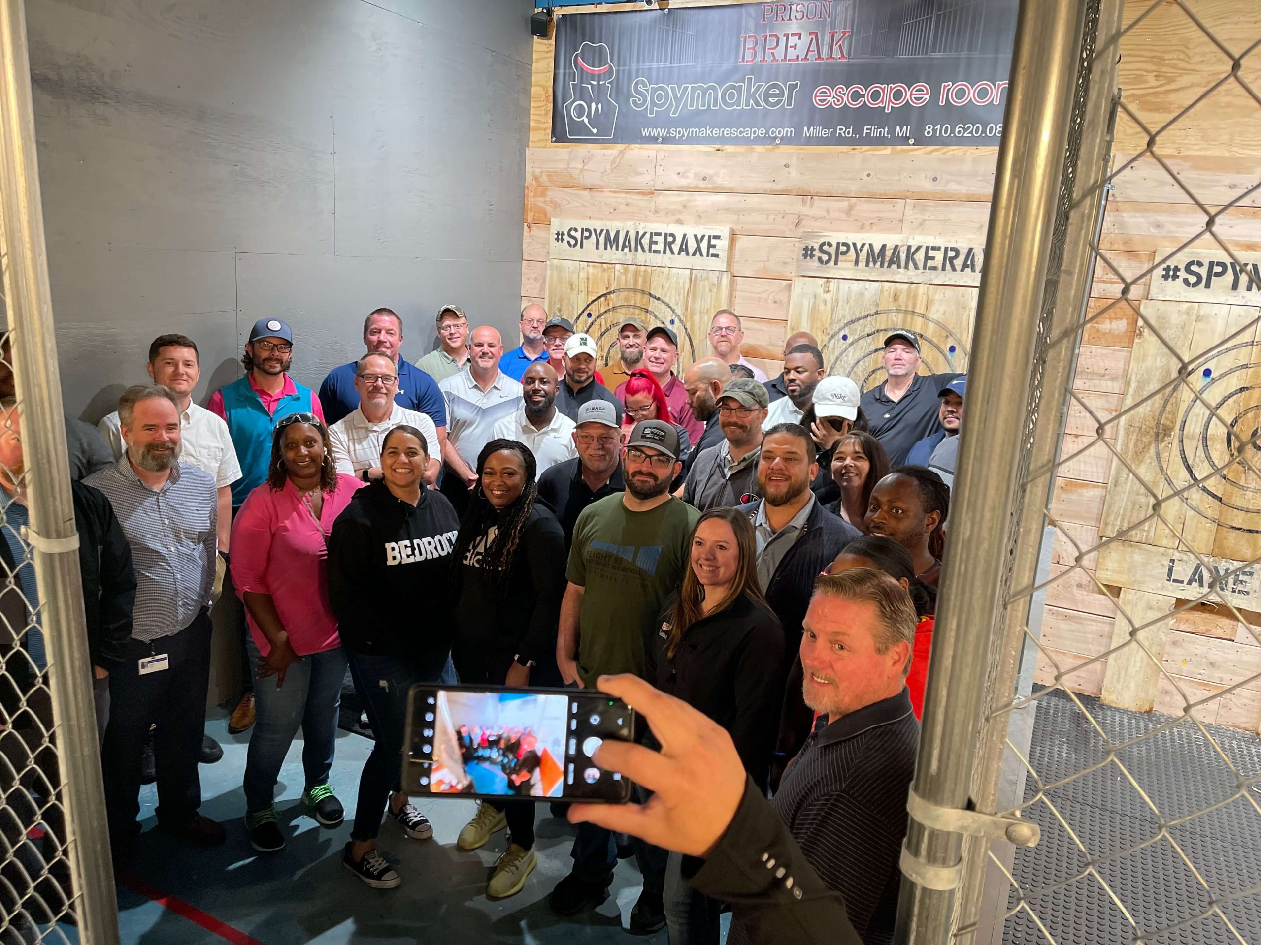 Large group party at Spymaker escape room and axe throwing in Burton MI